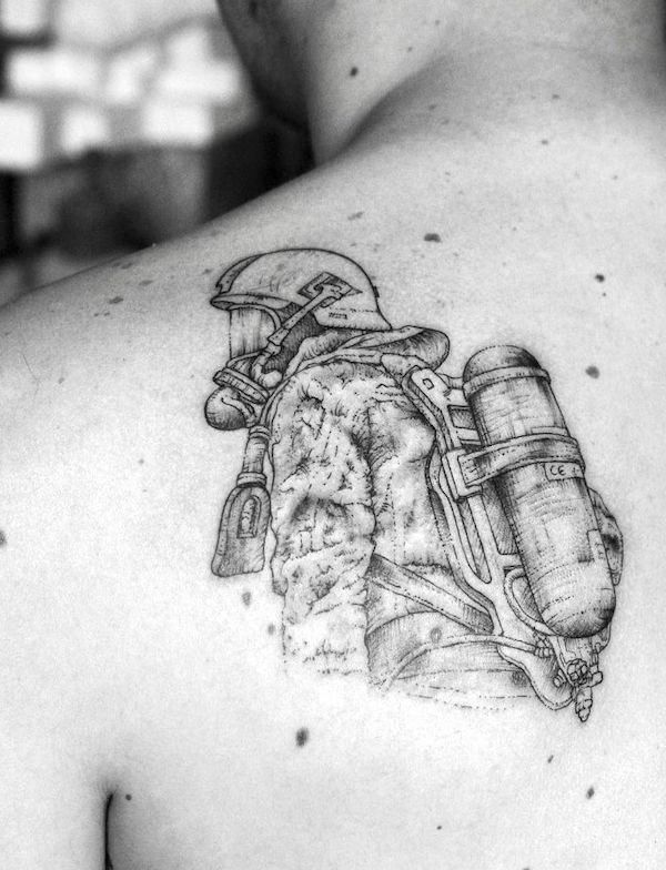 Sketch style firefighter back tattoo by @landercardon