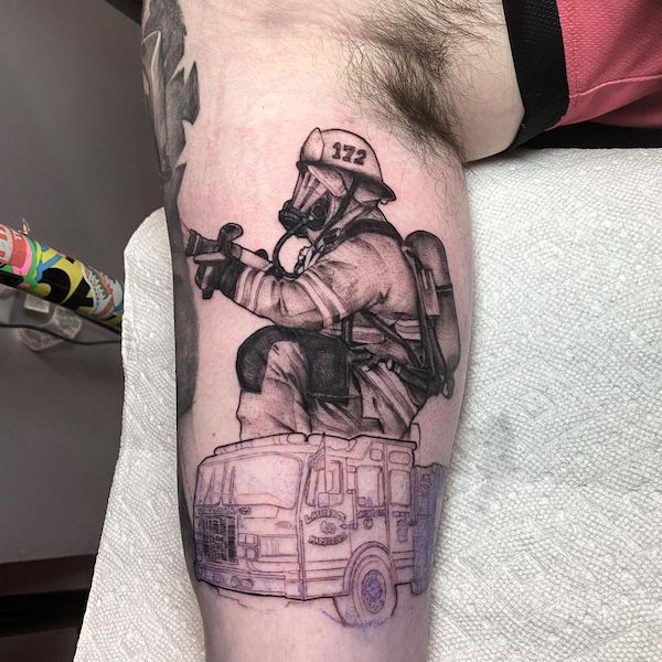 Vivid firefighter tattoo by @rcnj_tattoos