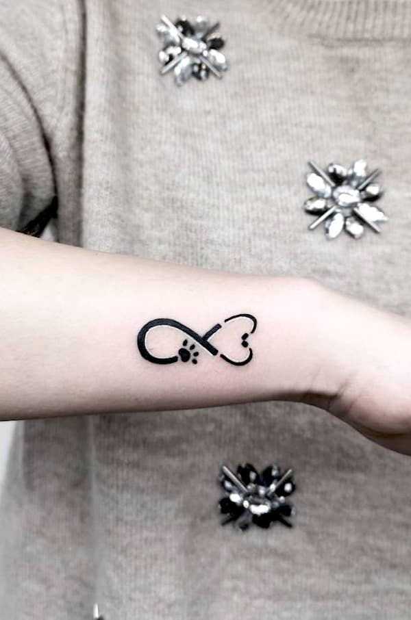 Stethoscope and infinity symbol tattoo by @nikita.tattoo