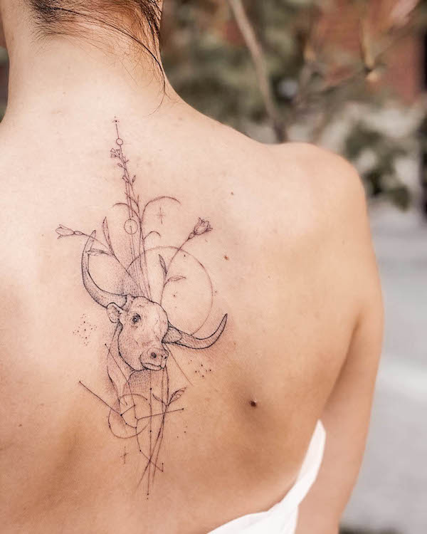 Intricate spine tattoo for Taurus by @aksinya.tattoo