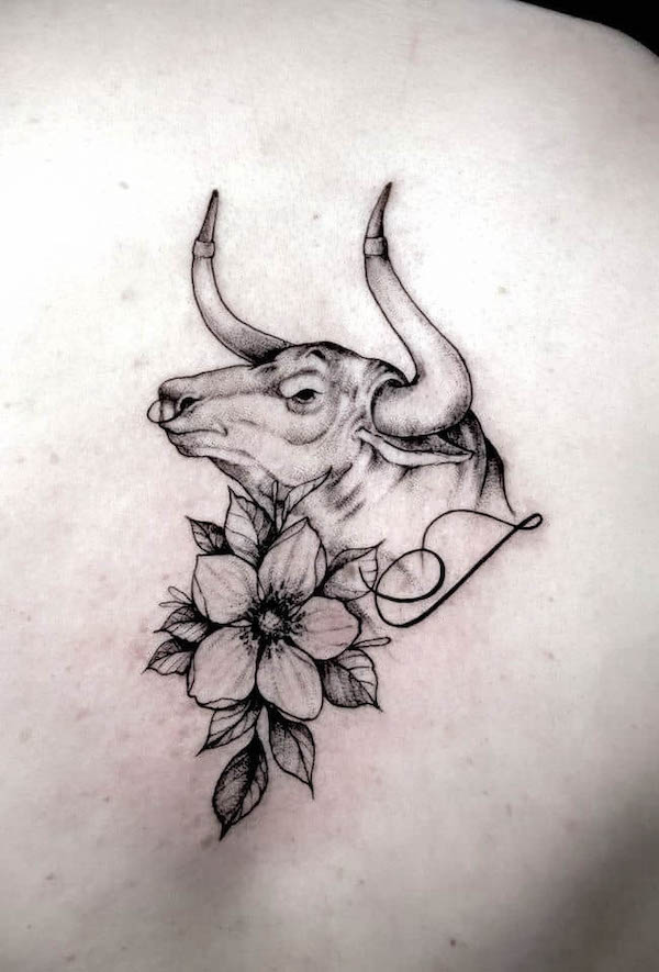 Elegant bull floral tattoo by @sangretinto