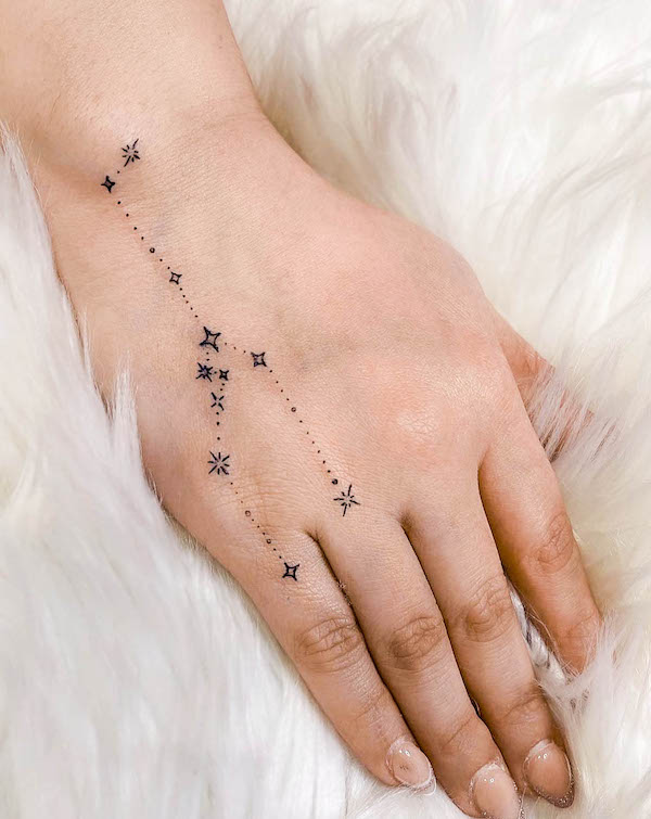 Taurus constellation hand tattoo by @cherie.beautyco