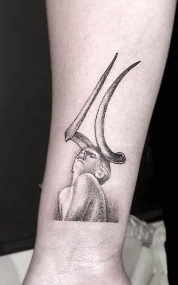 Black and grey Taurus tattoo by @fahrettinouz