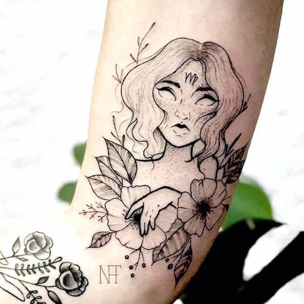 Un tatuaje de la diosa Virgo en el brazo por @nathaliatattoo