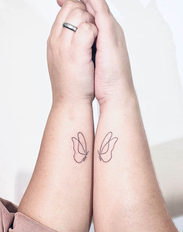 Simple butterfly outline tattoos for mother daughter by @kathrynrose_tattoo