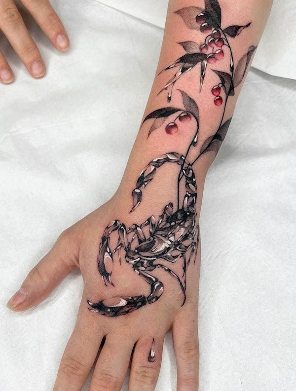 Scorpion and flowers hand tattoo by @arte.perdura