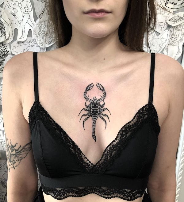 Scorpion on the chest by @hornypony.tatuarka - Scorpio tattoos for women that are pure dark aesthetics