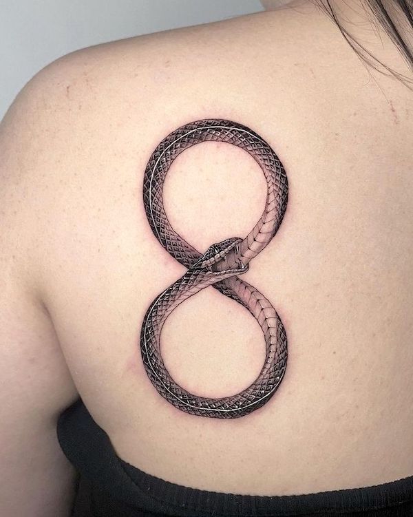 Infinity symbol ouroboros tattoo by @hangang_tattooz